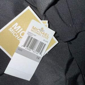 Michael Kors winter jacket with faux fur around hood. NWT